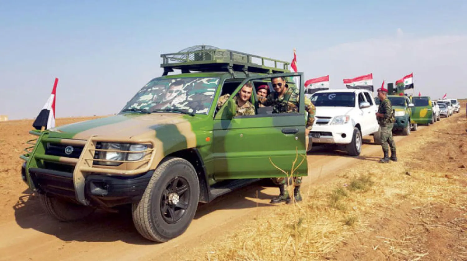 قوات سورية بين تل تمر ورأس العين في شمال شرقي سوريا في اكتوبر 2019 ( أ ف ب)