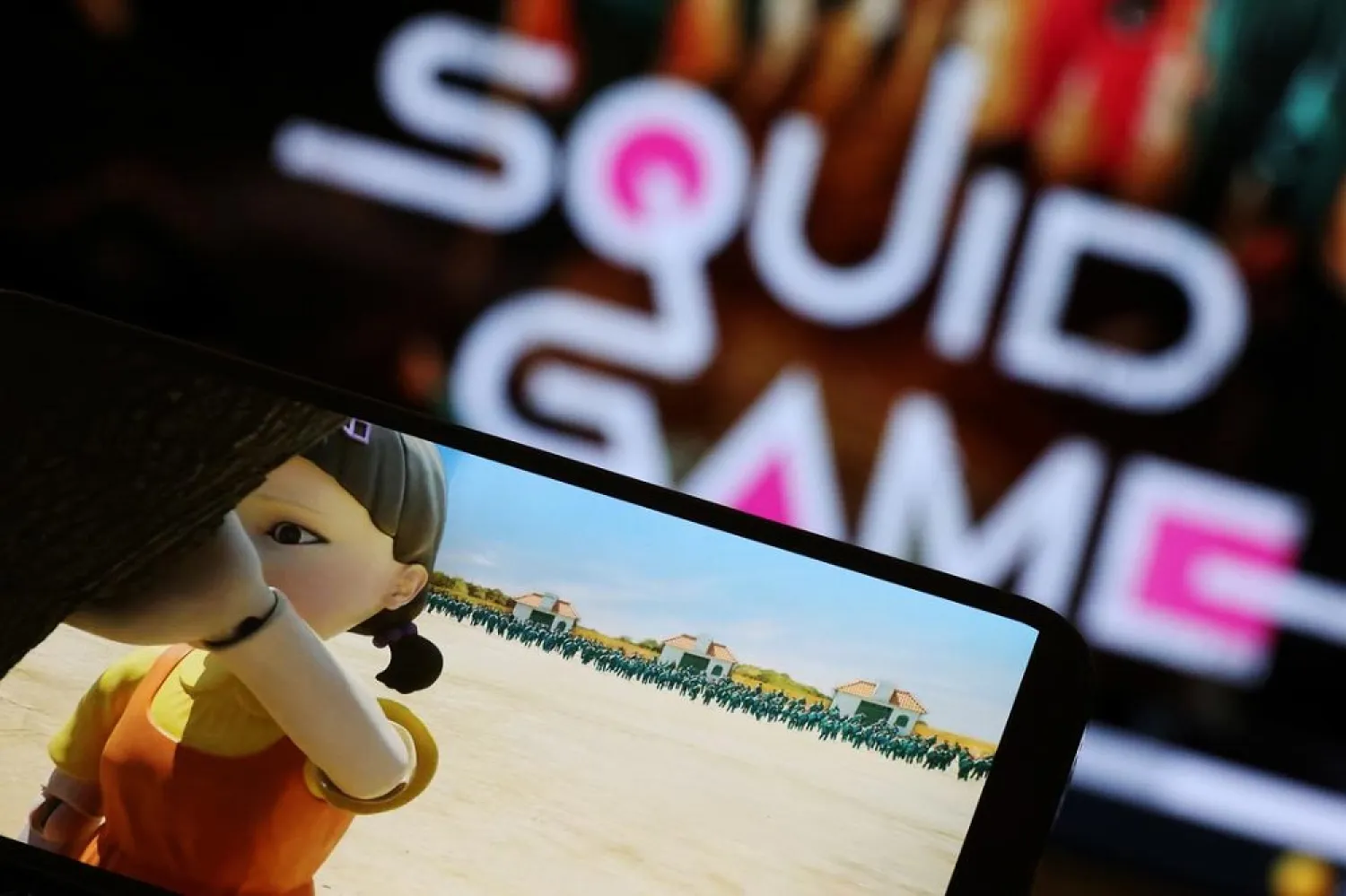 The Netflix series "Squid Game" is played on a mobile phone in this picture illustration taken September 30, 2021. (Reuters)