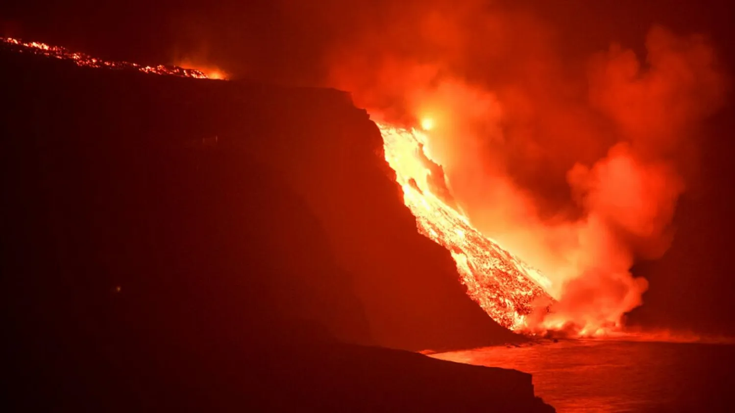 Lava from a volcano reaches the sea on the Canary island of La Palma, Spain in the early hours of Wednesday Sept. 29, 2021. Copyright  Credit: AP

