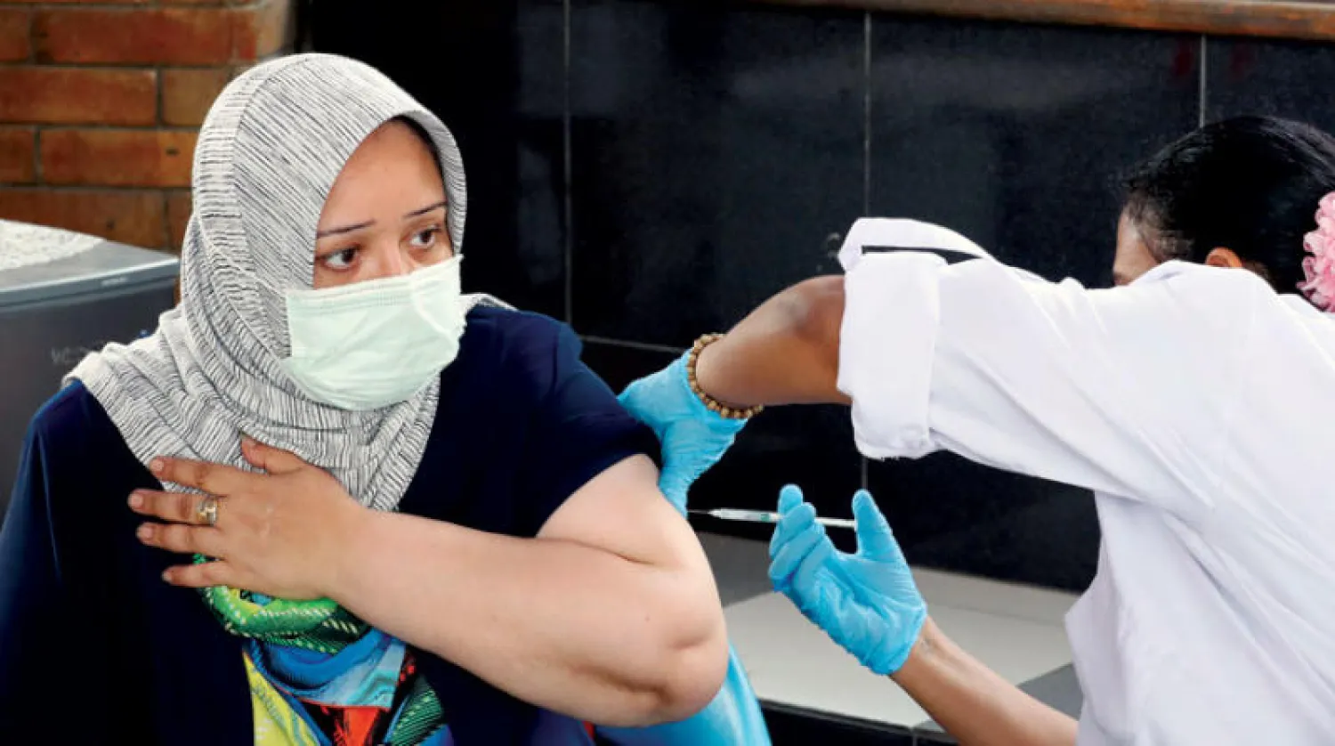 الوزن الزائد يرفع خطر الوفاة بـ «كورونا» (إ.ب.أ)