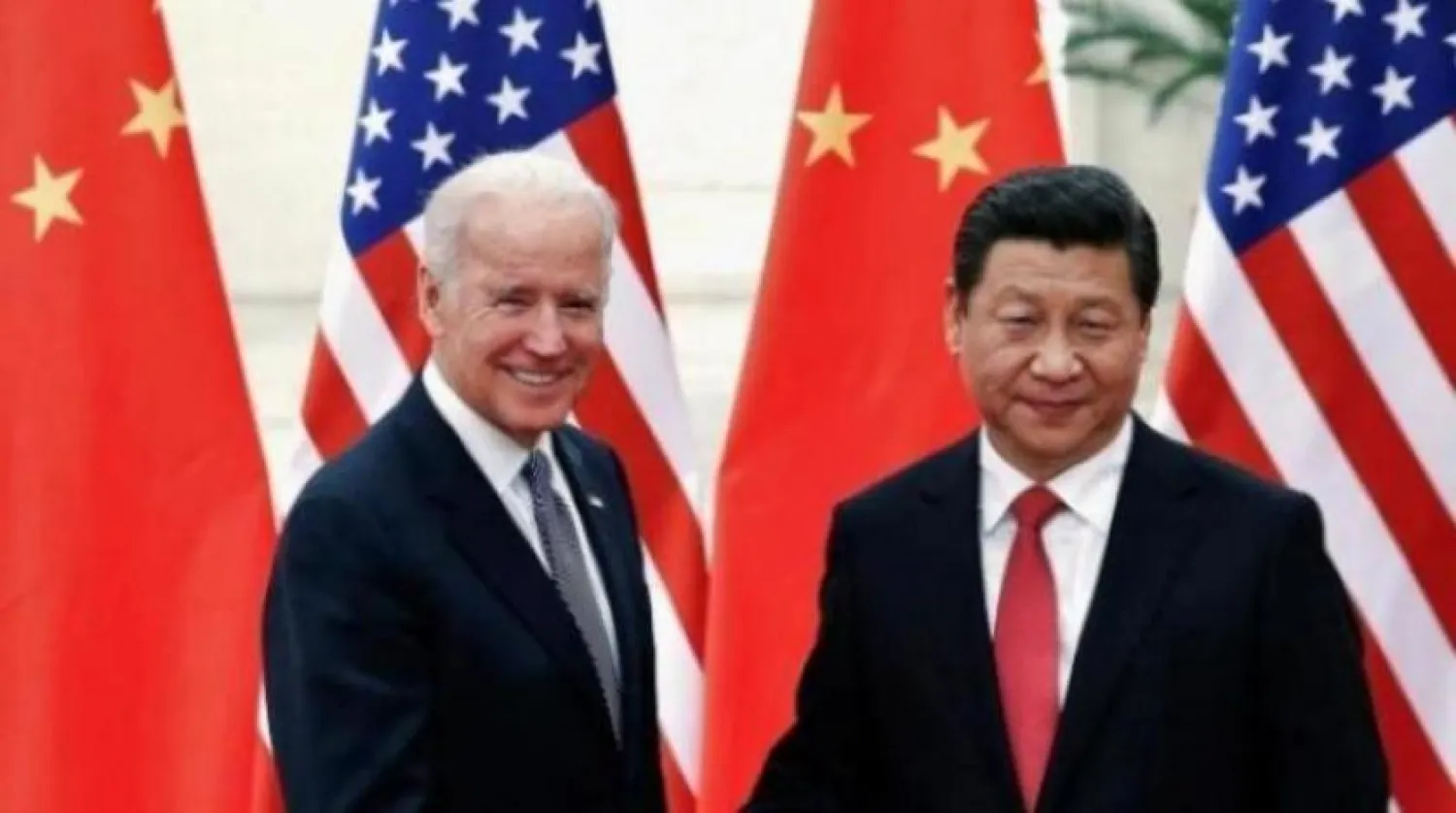 Çin Devlet Başkanı Şi Cinping, 2013’te dönemin ABD Başkan Yardımcısı Joe Biden ile Pekin’de (Reuters-Arşiv)