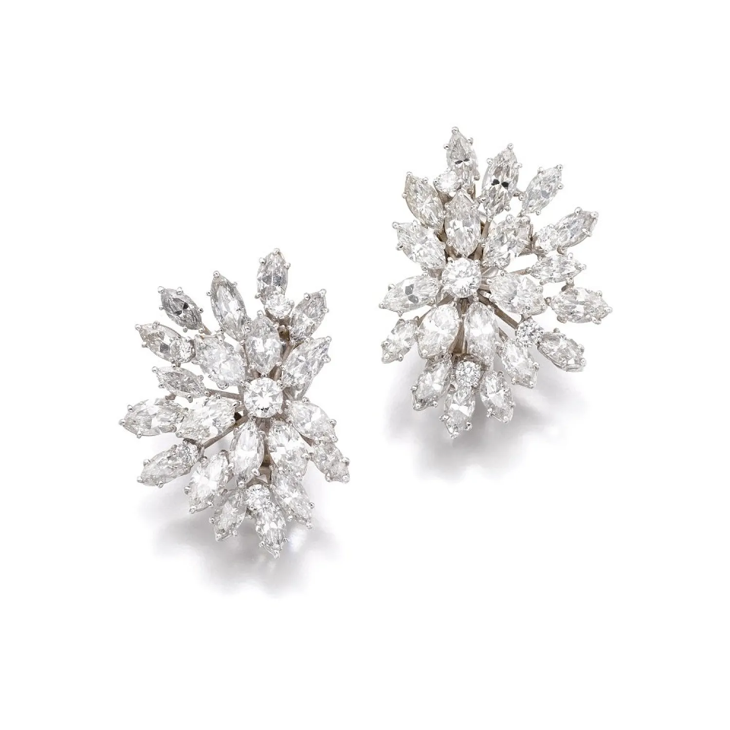 A pair of diamond cluster earrings by David Webb that used to belong to the late actress.