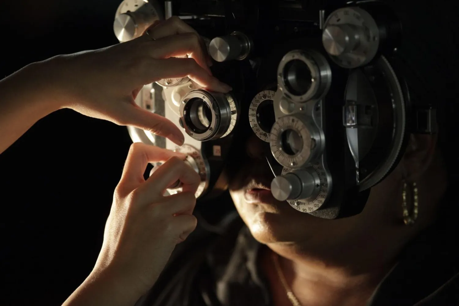 A free eye exam is performed on a patient at the Remote Area Medical clinic inside the Los Angeles Sports Arena in April 2010 in Los Angeles. Damian Dovarganes, AP