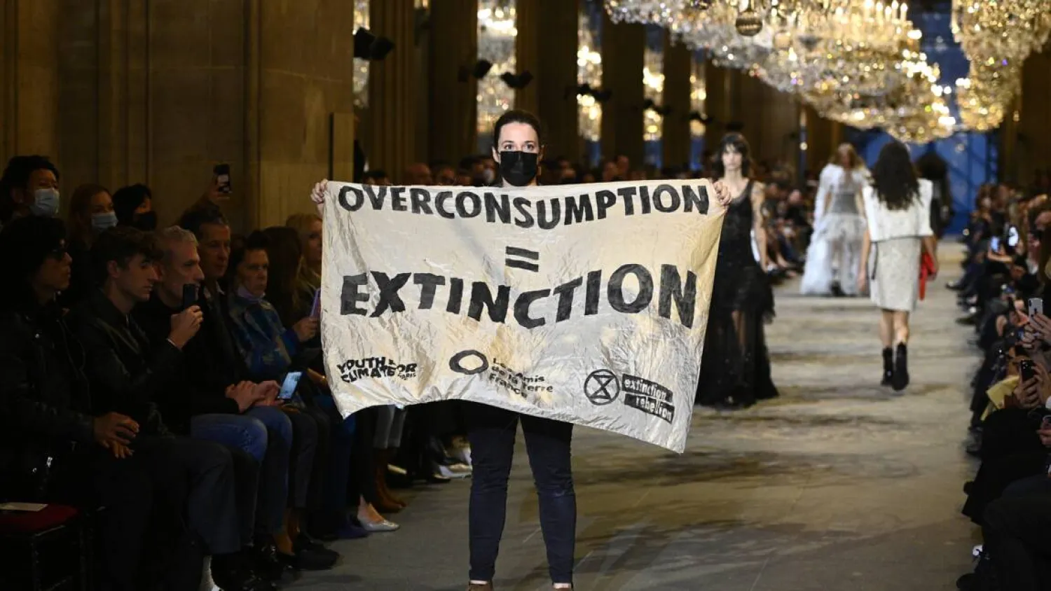 The protesters were highlighted over consumption in the fashion industry. Christophe ARCHAMBAULT AFP
