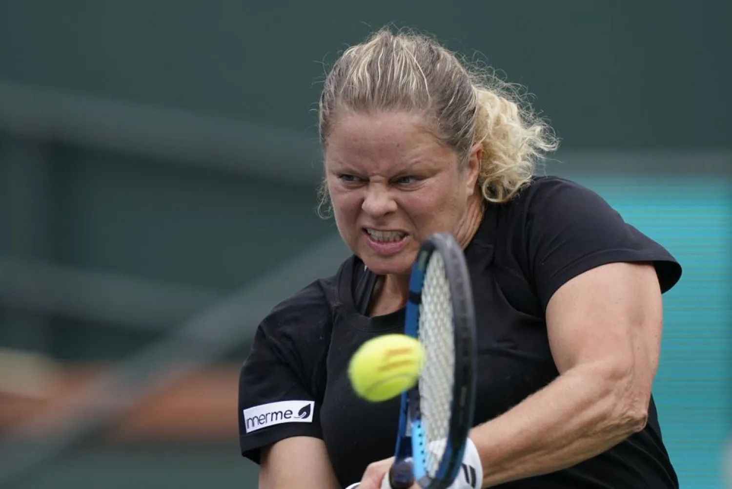 Kim Clijsters returns a shot to Katerina Siniakova at the BNP Paribas Open tennis tournament Thursday, Oct. 7, 2021, in Indian Wells, Calif. (AP)