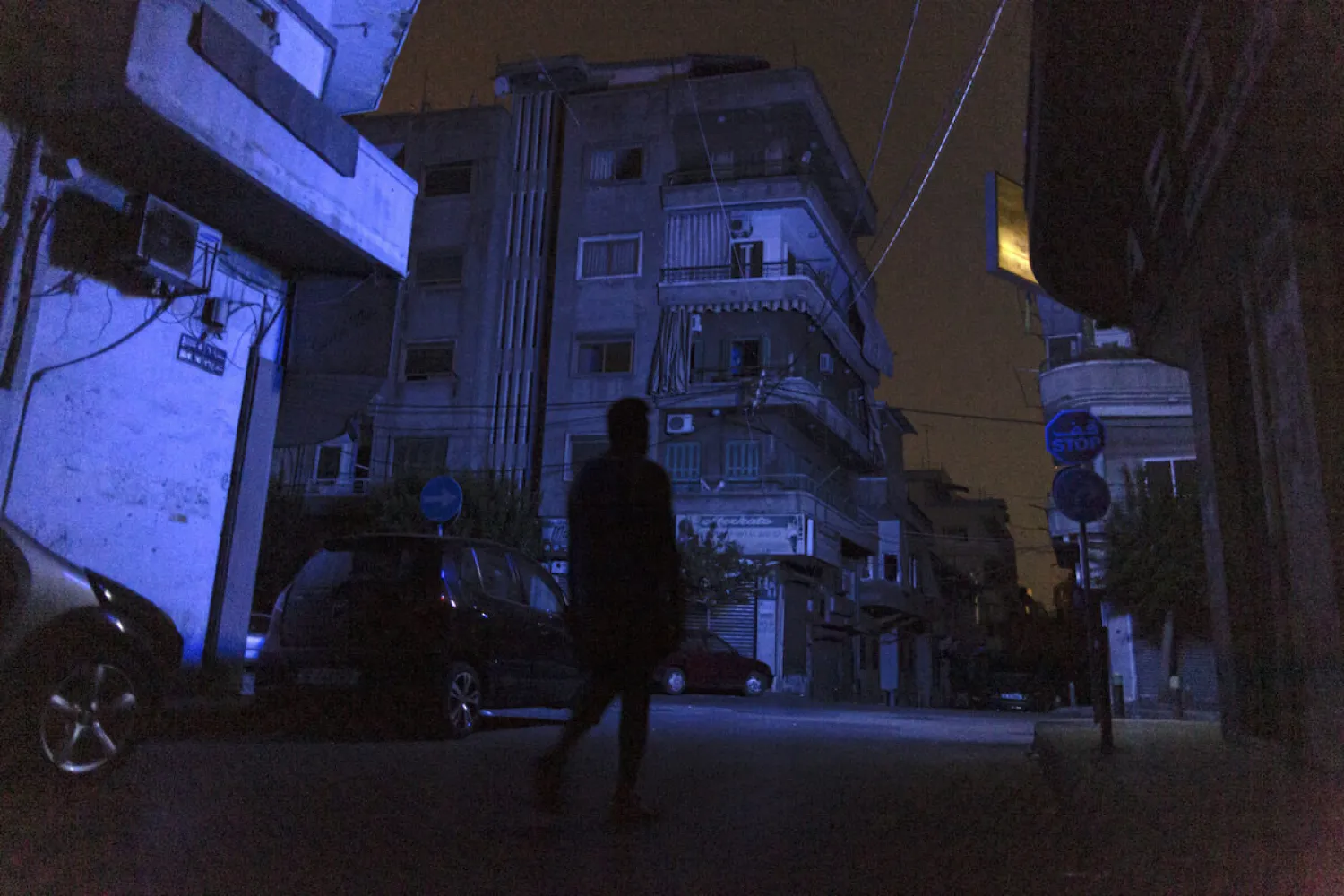 A man walks through Beirut during a blackout in Beirut, Lebanon, on Aug. 14, 2021. (Getty Images)