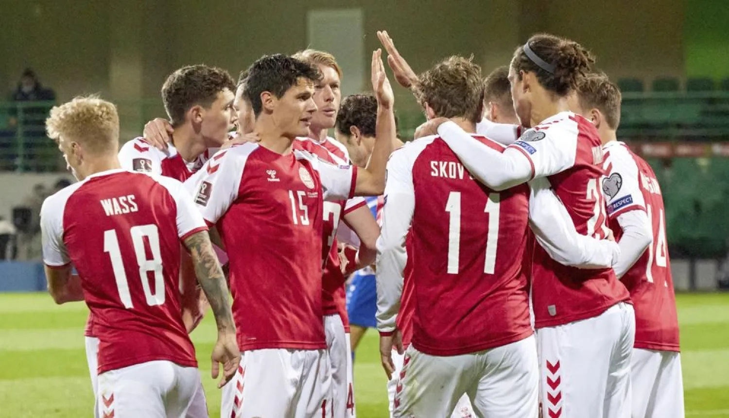 Denmark’s Andreas Skov Olsen celebrates after scoring his side’s first goal during the World Cup qualifying match against Moldova, at the Zimbru stadium in Chisinau, Moldova, Saturday, Oct. 9, 2021. (AP)