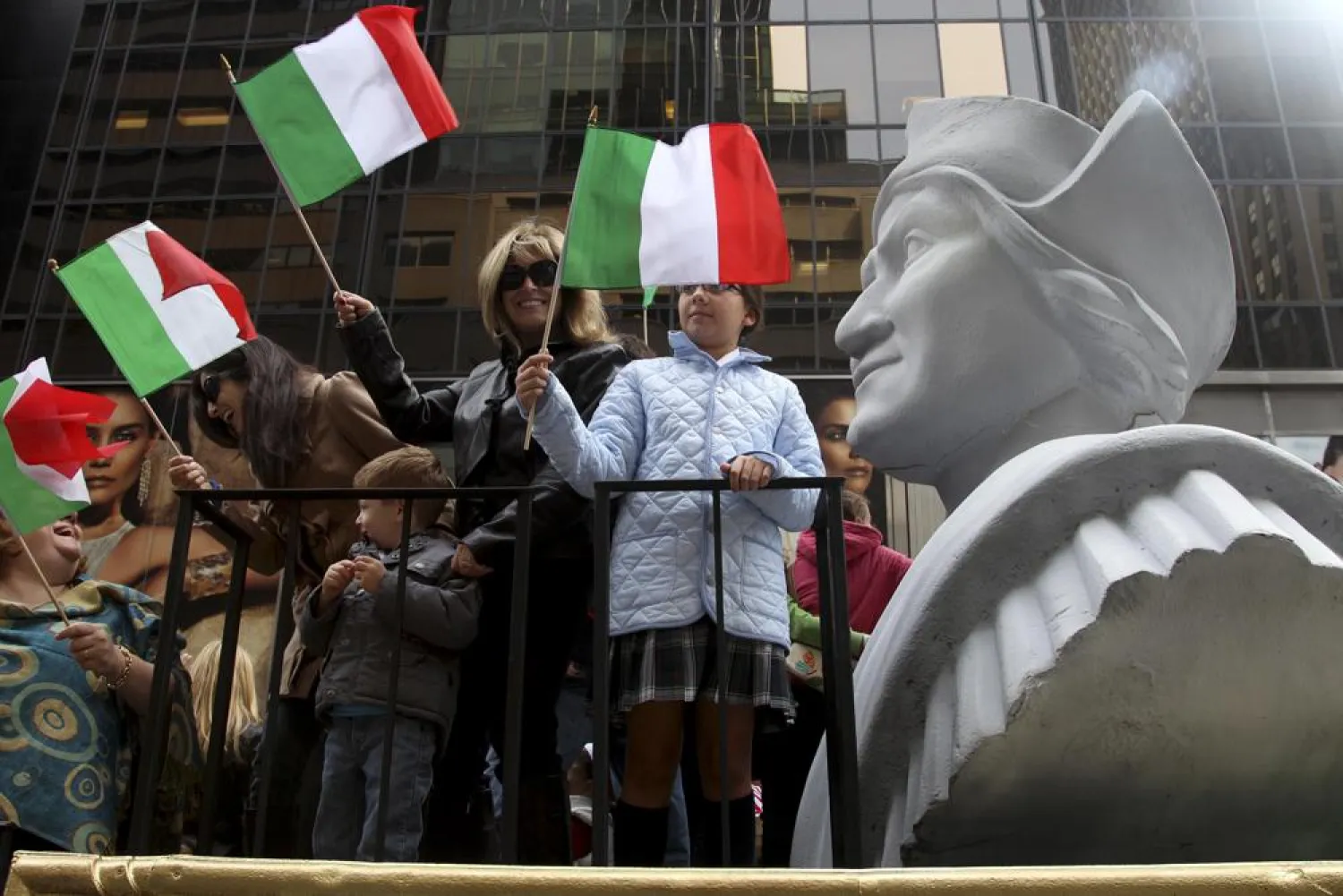 In this Oct. 8, 2012 file photo, people ride on a float with a large bust of Christopher Columbus during the Columbus Day parade in New York. (AP)