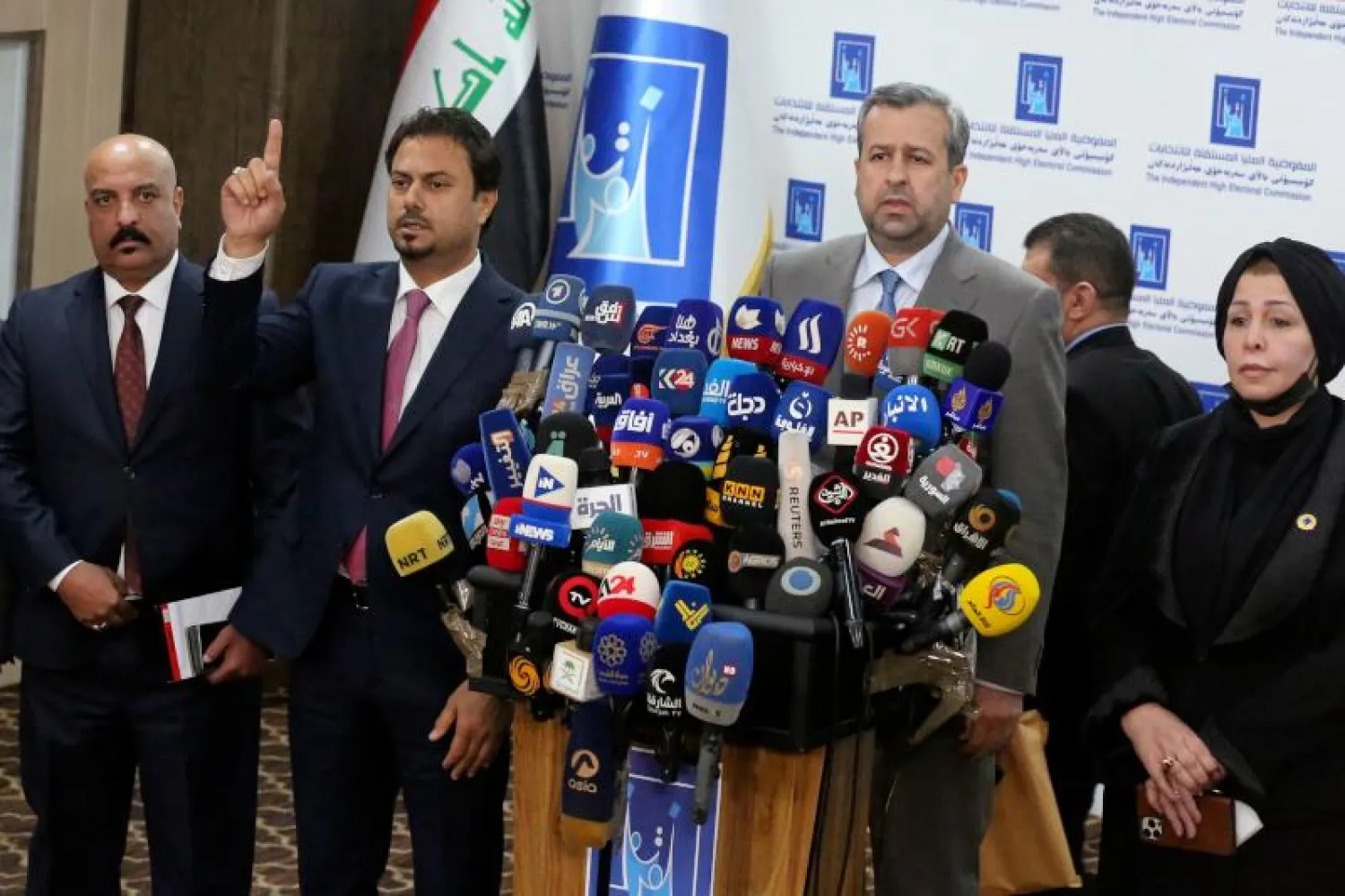 من وقائع المؤتمر الصحافي لمفوضية الانتخابات العراقية (أ.ف.ب)