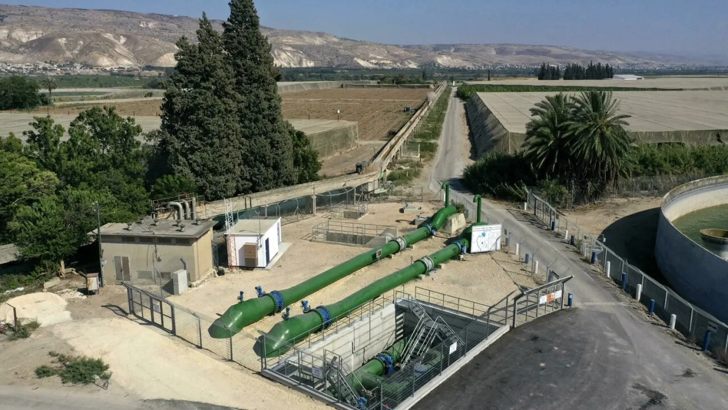 A picture from July 2021 shows a pipe system used to transfer water from Israel to Jordan, near their border and south of the Sea of Galilee. (AFP)