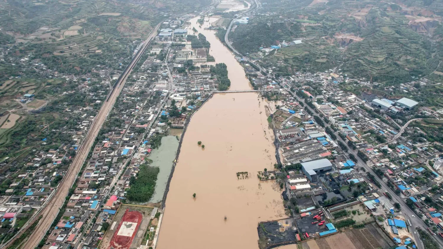 There has been unseasonably heavy rain and flooding in north China's Shanxi province. STR AFP
