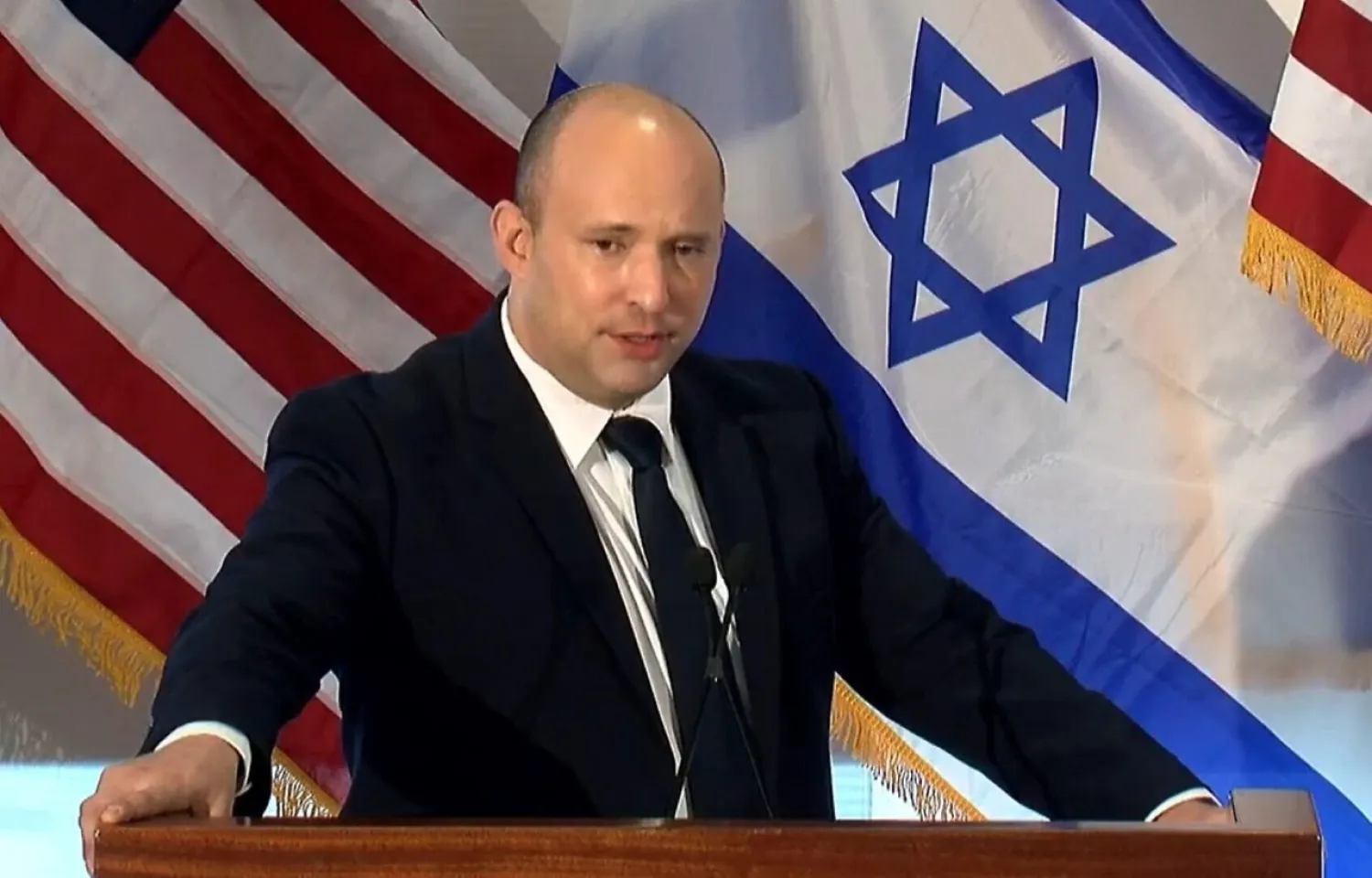 Prime Minister Naftali Bennett addresses leaders of the North American Jewish community, hosted by the Jewish Federations of North America, in New York on September 27, 2021 (Reuters) 


