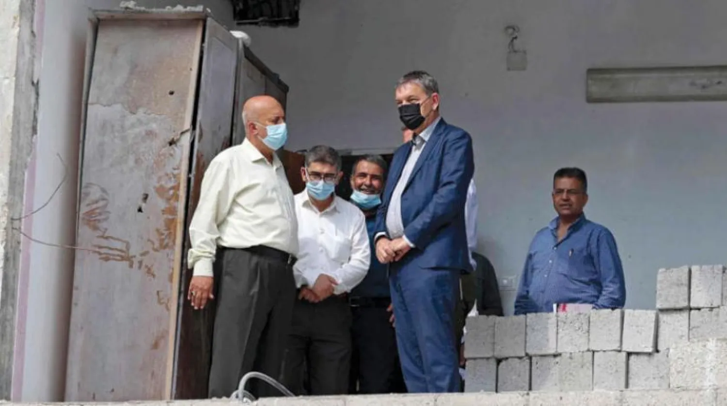 Lazzarini as he inspects damaged buildings in Gaza. (AFP)