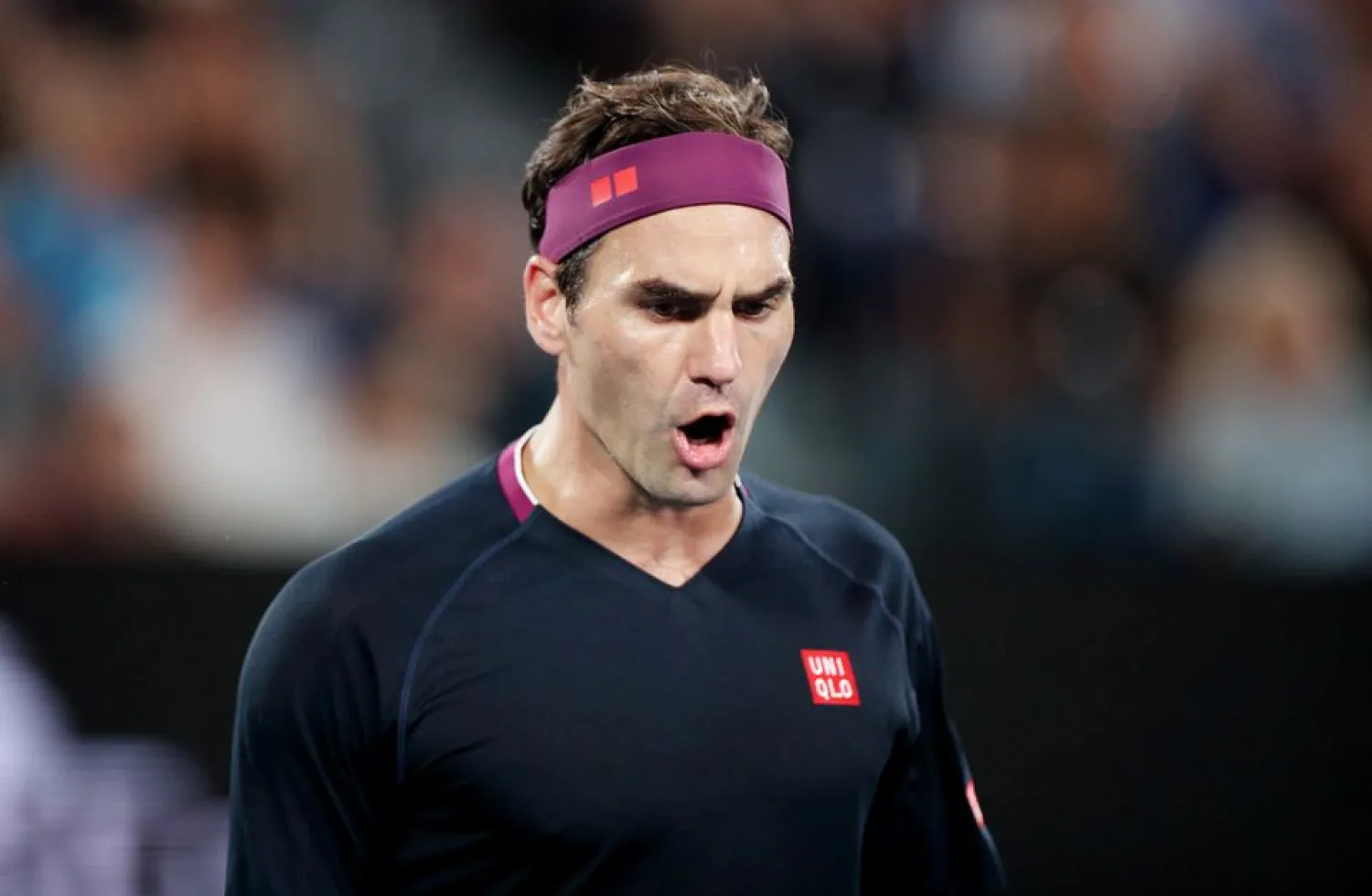 Tennis - Australian Open - Semi Final - Melbourne Park,
Melbourne, Australia - January 30, 2020. Switzerland's Roger Federer
reacts during his match against Serbia's Novak Djokovic.
REUTERS/Hannah Mckay