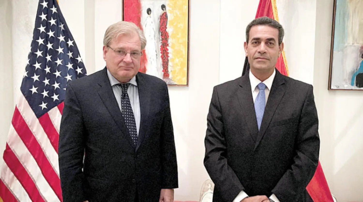 ريتشارد نورلاند مبعوث أميركا الخاص لدى ليبيا وعماد السائح رئيس المفوضية الوطنية العليا للانتخابات (السفارة الأميركية)