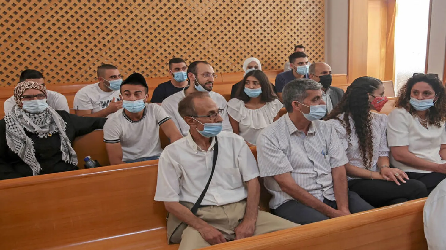Palestinian residents of the Sheikh Jarrah neighborhood in Jerusalem attend a hearing at Israel's Supreme Court, Jerusalem, August 2, 2021. Ahmad Gharabli/AFP via Getty Images
