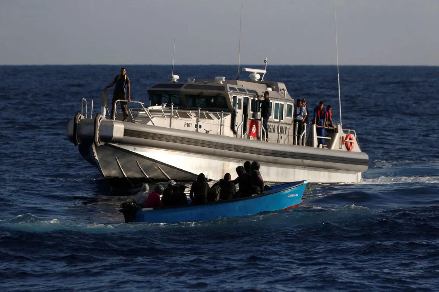 Migrants on a wooden boat are rescued. Reuters file photo