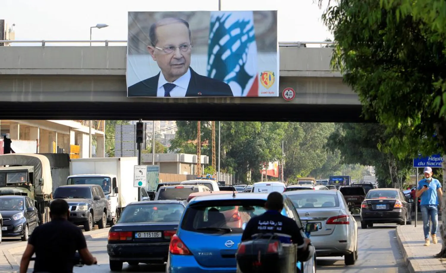A poster of Lebanon's President Michel Aoun is seen in Hadath, Lebanon September 15, 2020. (Reuters)