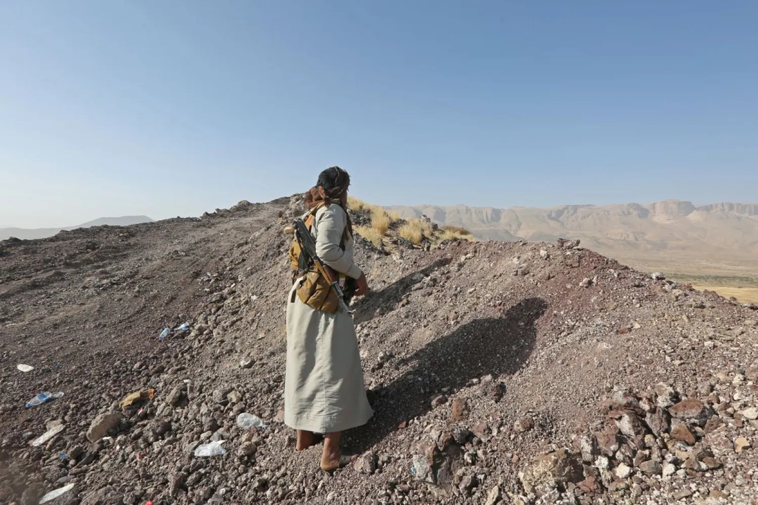 A pro-government tribal fighter stands at a position where he fights against the Houthis in Marib, Yemen October 2, 2020. (Reuters)