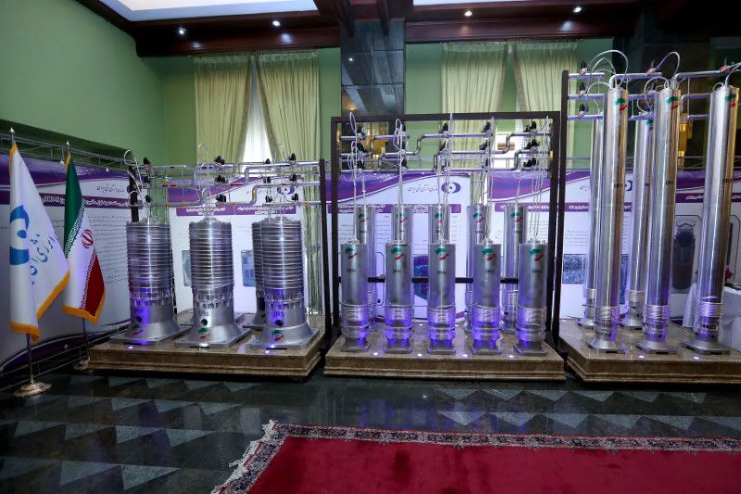 A number of new generation Iranian centrifuges are seen on display during Iran’s National Nuclear Energy Day in Tehran, Iran April 10, 2021. (WANA/Handout via Reuters)