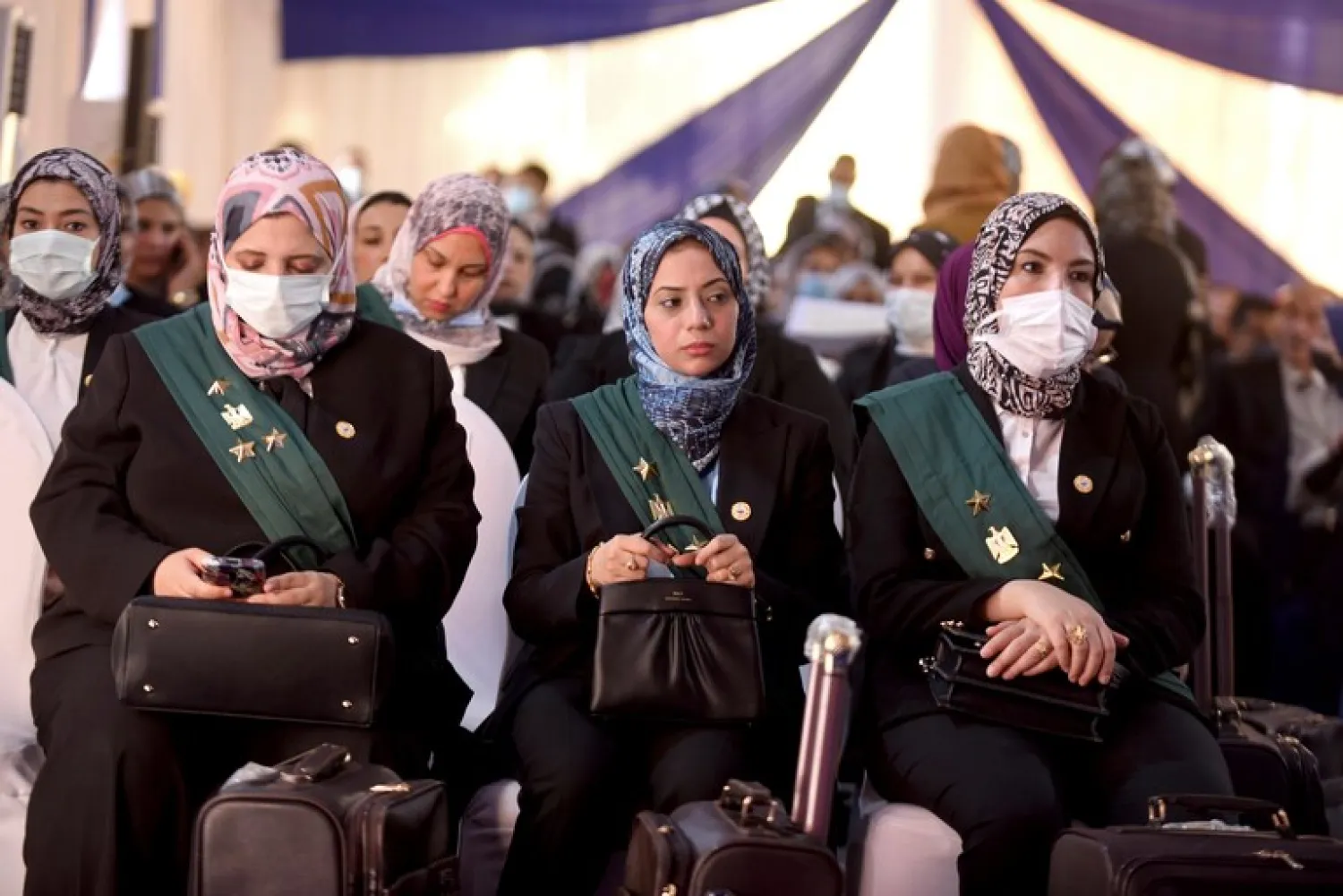 Judges attend a swearing-in ceremony before Egypt’s State Council’s chief judge Mohammed Hossam el-Din in a celebratory event in Cairo, Egypt, Tuesday, Oct. 19, 2021. (AP Photo/Tarek Wajeh)