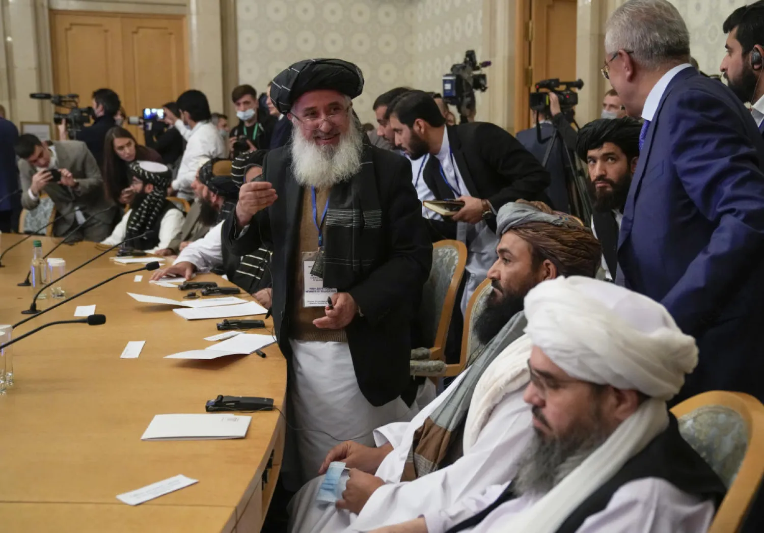 Members of the political delegation from the Afghan Taliban's movement attend talks involving Afghan representatives in Moscow, Russia, Wednesday, Oct. 20, 2021. (AP Photo/Alexander Zemlianichenko, Pool)

