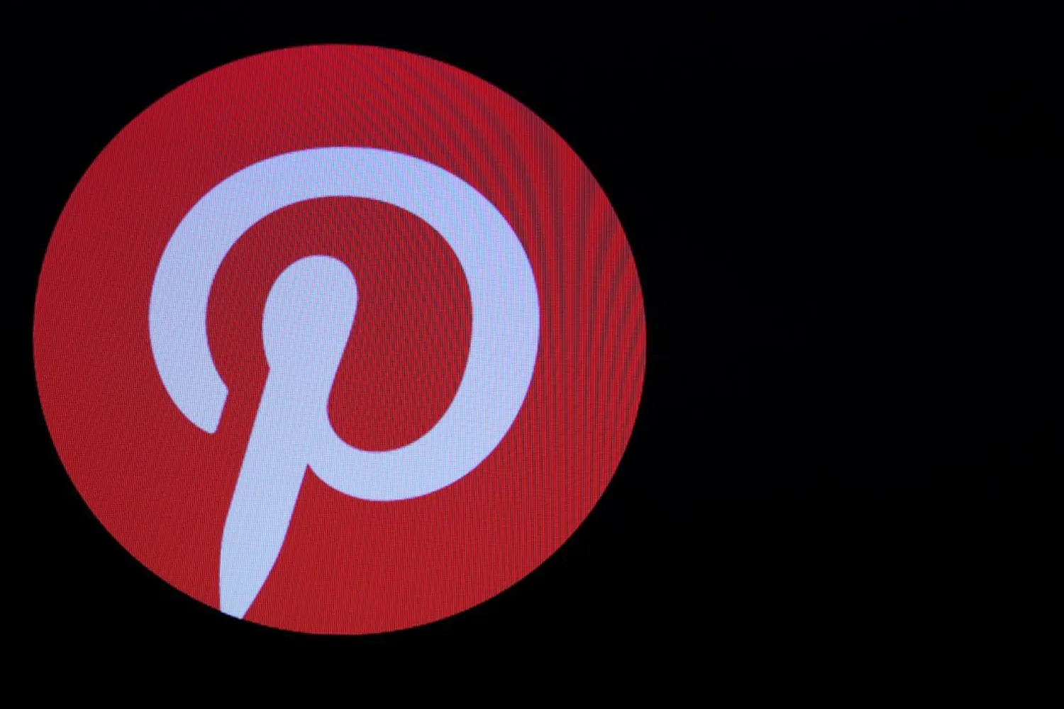 Screens display the company logo for Pinterest Inc. during the company's IPO on the front of the New York Stock Exchange (NYSE) in New York, US, April 18, 2019. (Reuters)