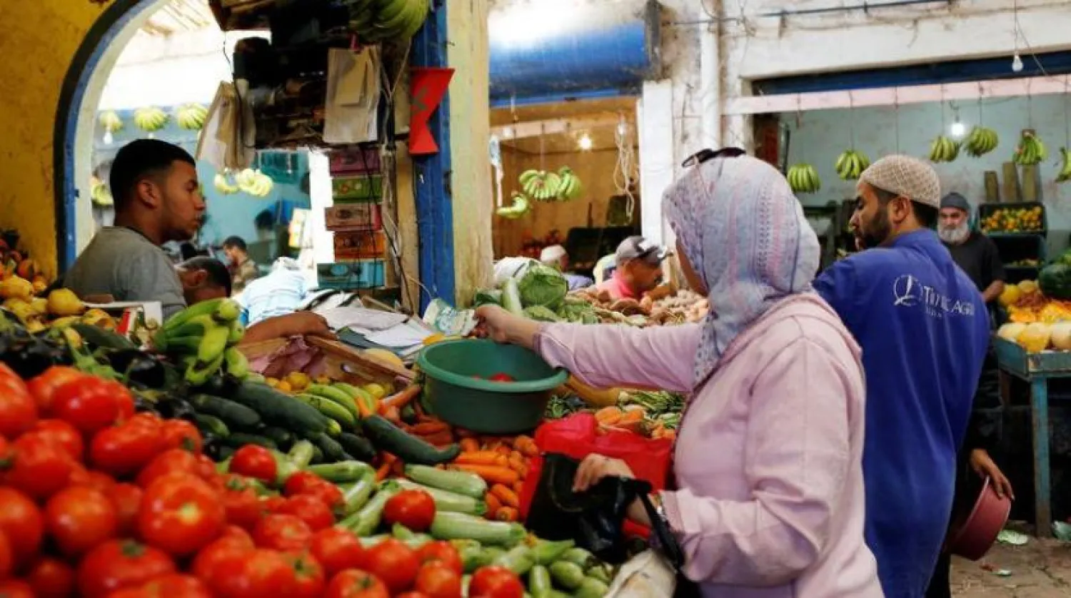 Vendors sell fruits and vegetables at a market in Rabat. (Reuters)
