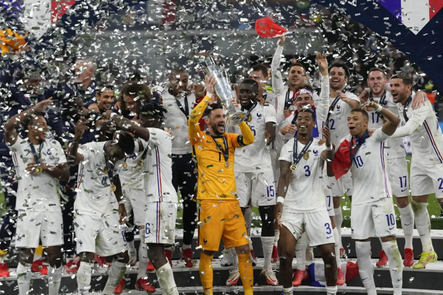 France's players celebrate their victory at the end of the UEFA Nations League final soccer match between France and Spain at the San Siro stadium, in Milan, Italy, Sunday, Oct. 10, 2021. (AP Photo/Luca Bruno)
