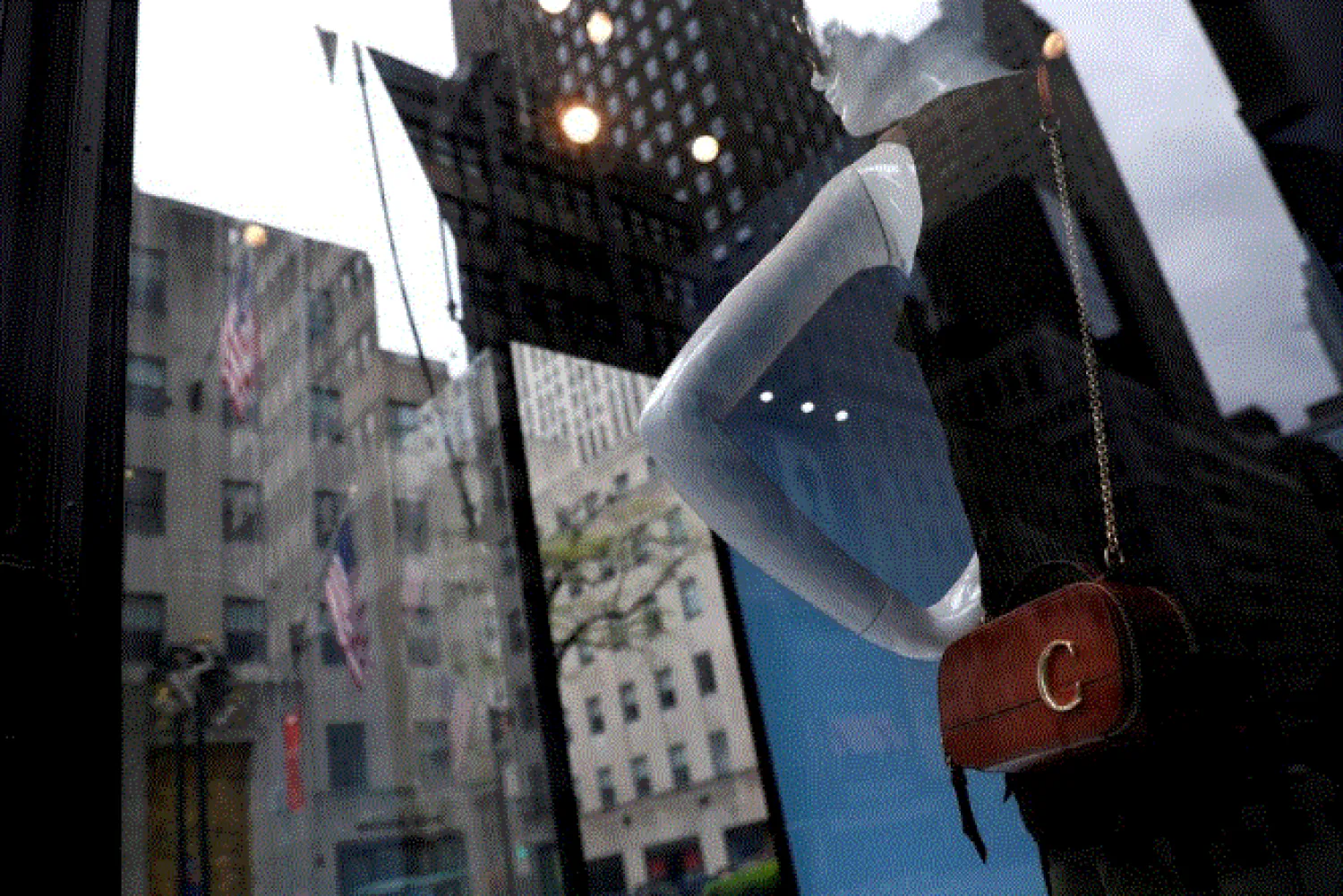 Mannequins are seen inside a closed Gucci store on 5th Avenue, during the outbreak of the coronavirus disease (COVID-19), in Manhattan, New York city, New York, U.S., May 11, 2020. REUTERS/Mike Segar/File Photo

