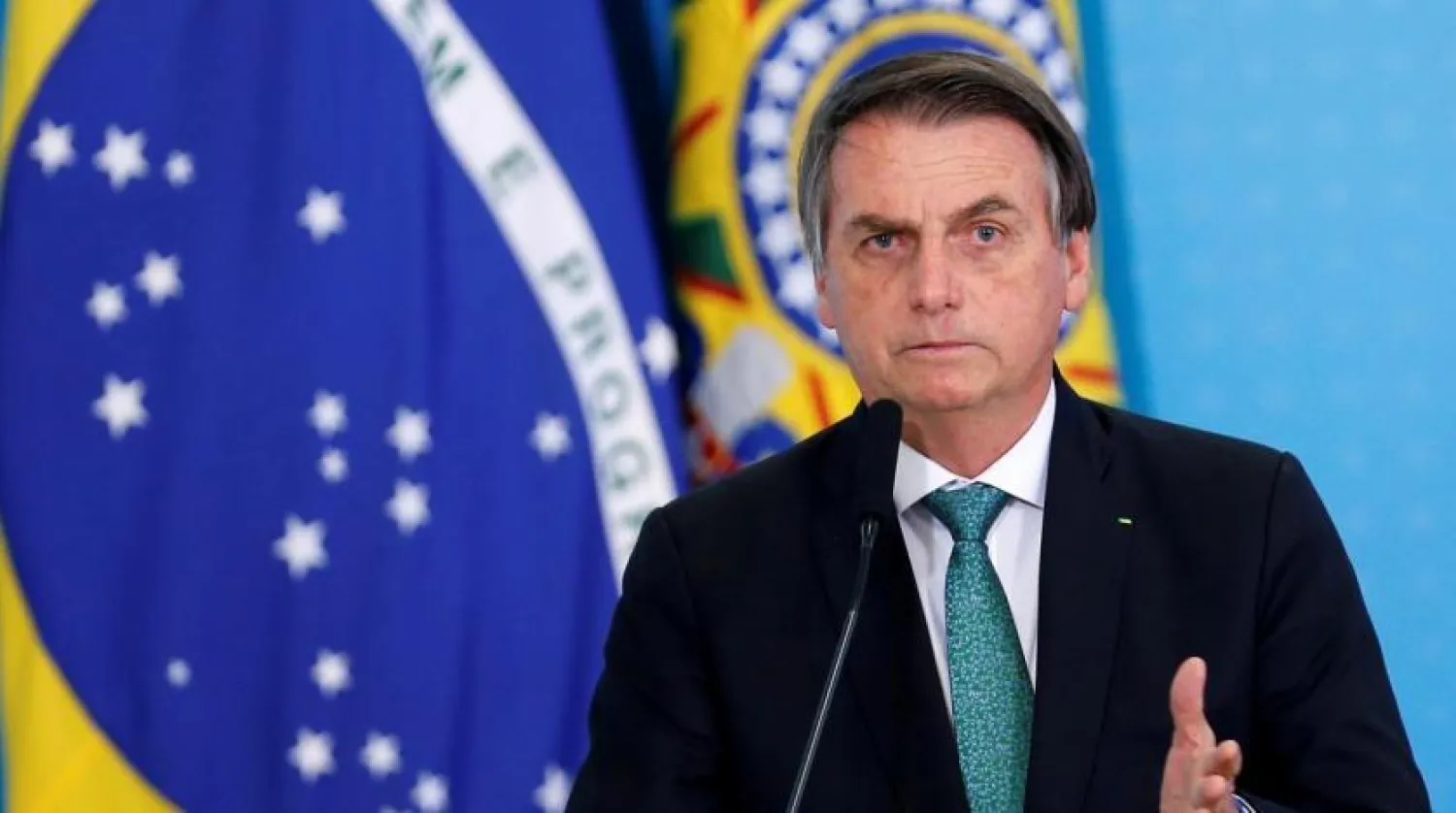FILE PHOTO: Brazil's President Jair Bolsonaro speaks during a ceremony to launch the new worker fund stimulus at the Planalto Palace in Brasilia, Brazil July 24, 2019. REUTERS/Adriano Machado
