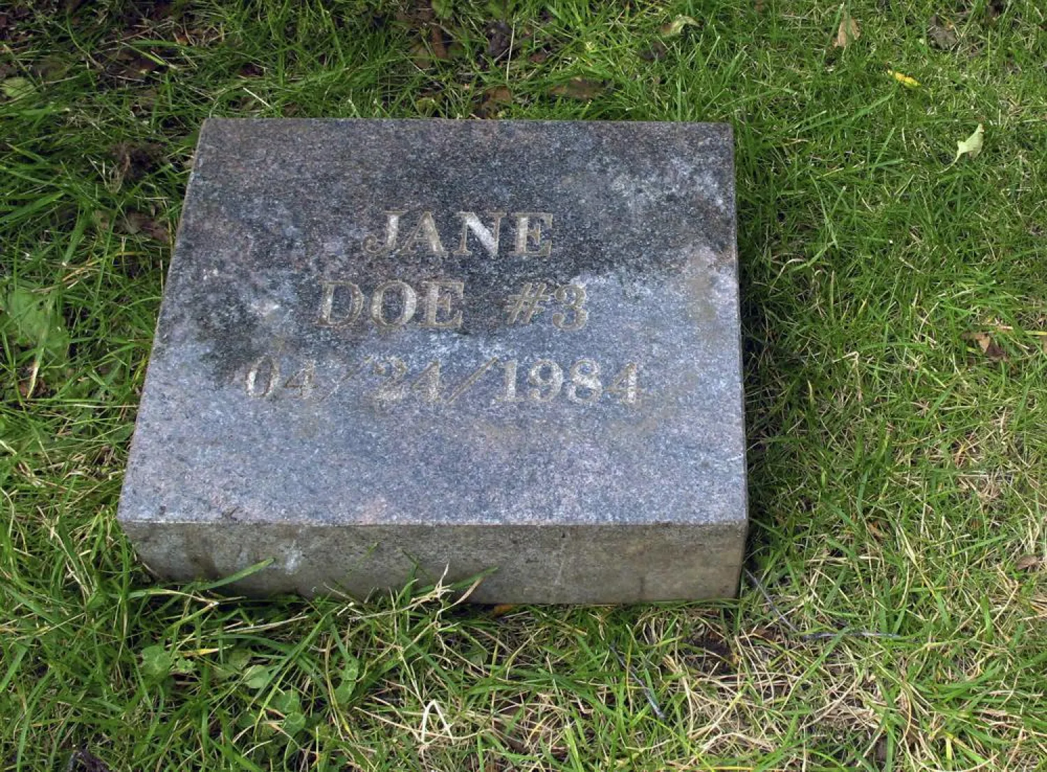  FILE - This Wednesday, Sept. 3, 2014, file photo shows the grave marker for Jane Doe #3 from a cemetery in Anchorage, Alaska. The remains of a woman known for 37 years only as Horseshoe Harriet, one of 17 victims of a notorious Alaska serial killer, have been identified through DNA profiling as Robin Pelkey, authorities said Friday, Oct. 22, 2021. (AP Photo/Rachel D'Oro, File)
