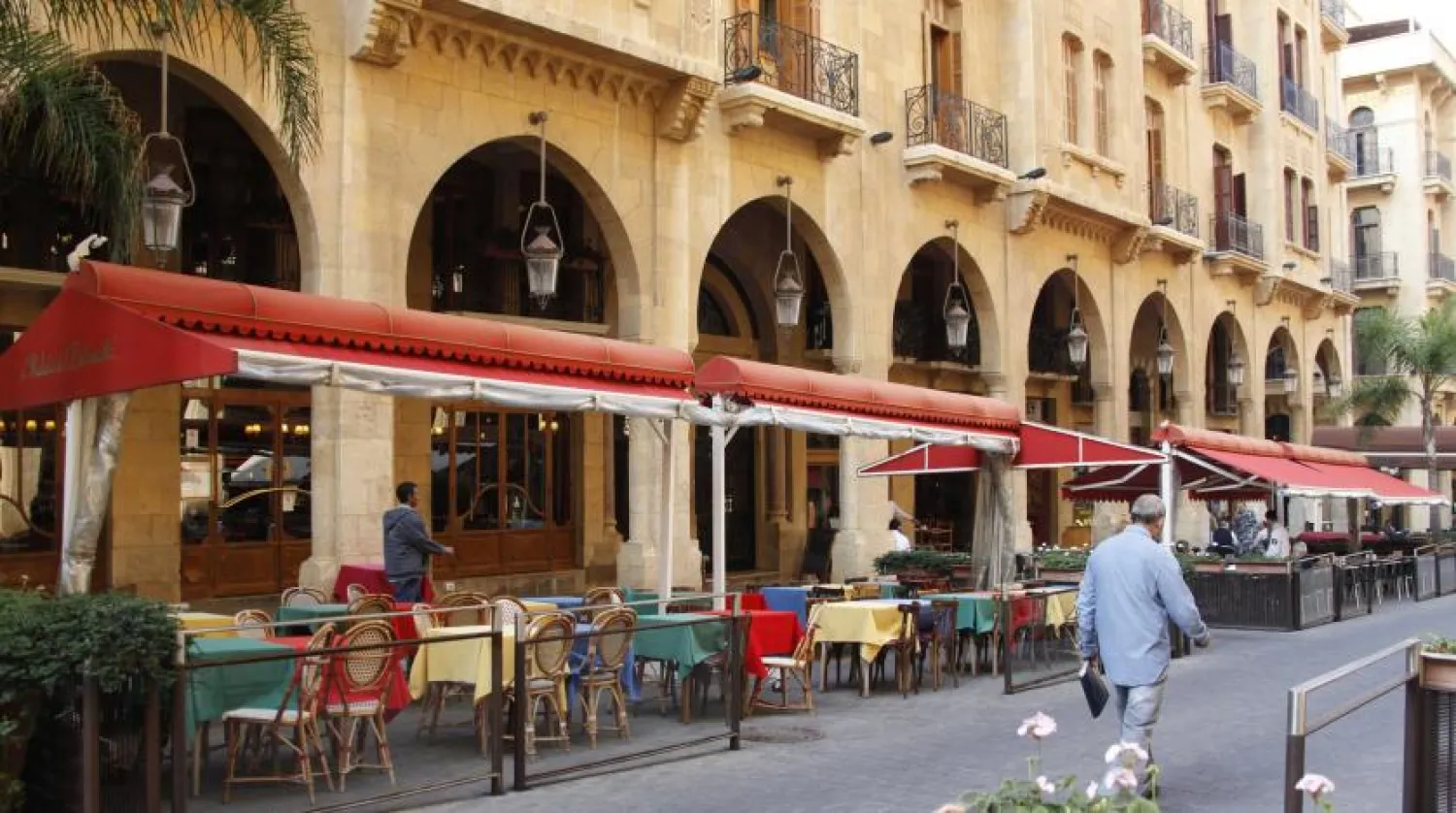 People walk past empty restaurants in downtown Beirut, Lebanon, Nov. 20, 2012. Reuters file photo
