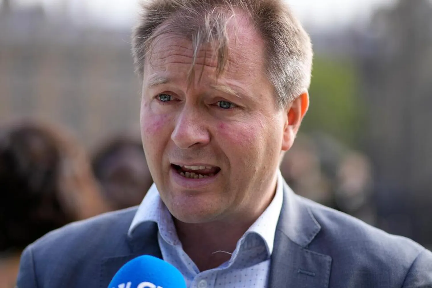 In this Thursday. Sept. 23, 2021 file photo, Richard Ratcliffe, the husband of imprisoned British-Iranian Nazanin Zaghari-Ratcliffe gives a television interview in Parliament Square, London, whilst marking the 2,000 days she has been detained in Iran. (AP)