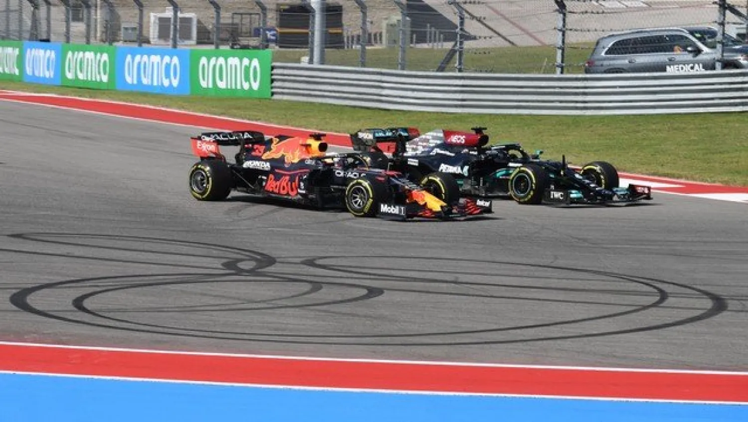 Side-by-side: Max Verstappen (left) and Lewis Hamilton fight for the lead. Robyn Beck AFP
