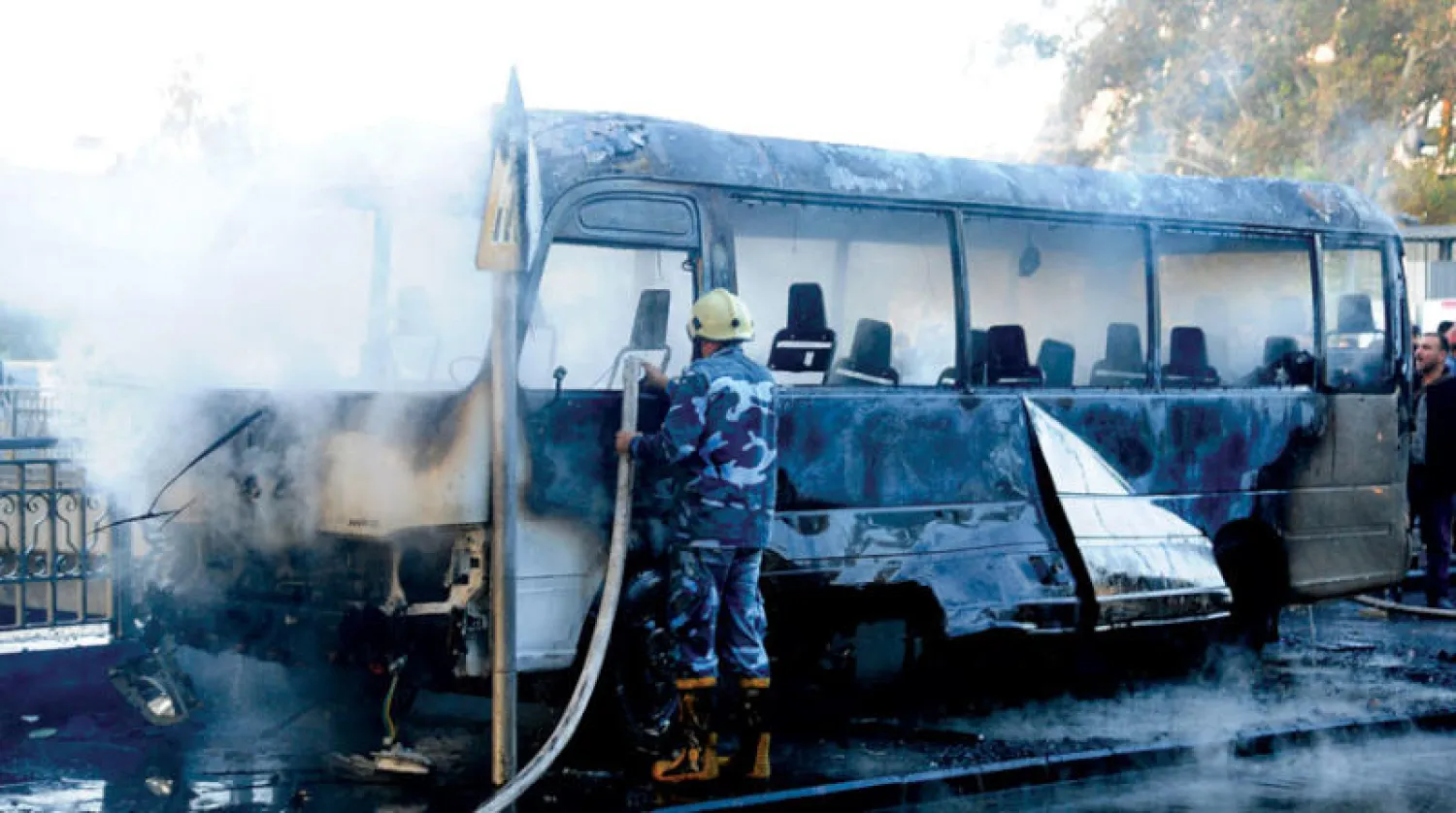 تفجير حافلة تقل عسكريين في دمشق في 20 من الشهر الحالي (أ.ف.ب)
