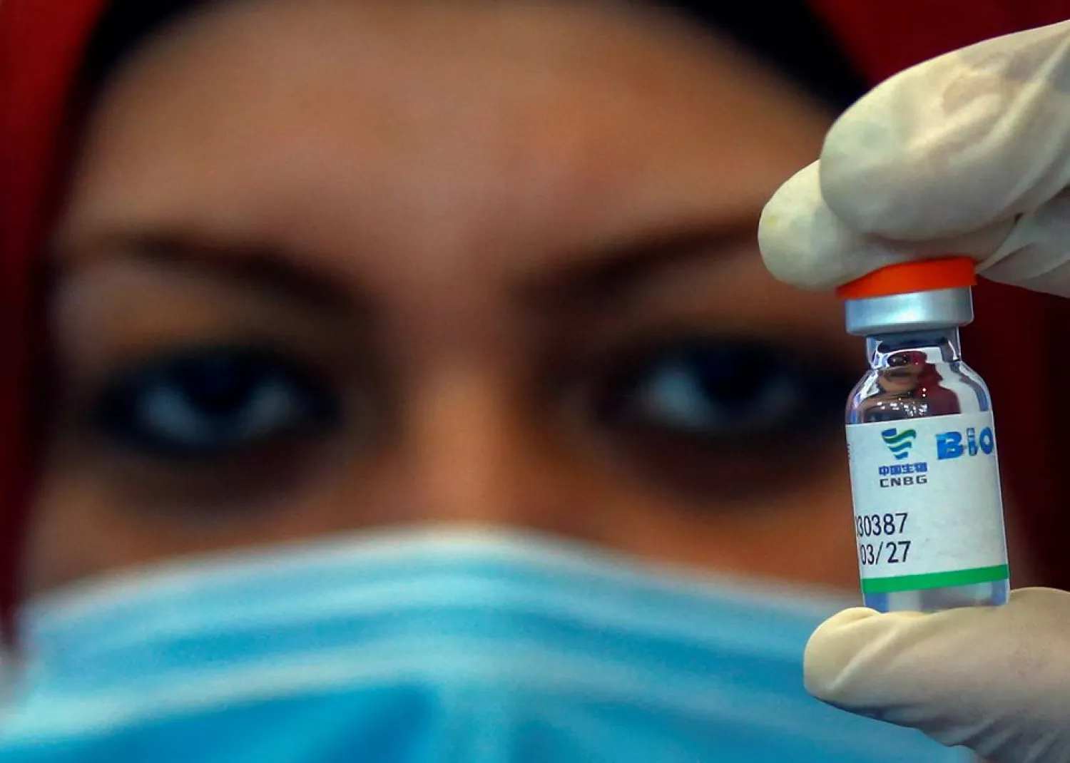 A nurse shows a vial of China's Sinopharm vaccine against the coronavirus disease (COVID-19) at a mass immunization venue inside Cairo's International Exhibition Center in Cairo, Egypt June 2, 2021. REUTERS/Amr Abdallah Dalsh
