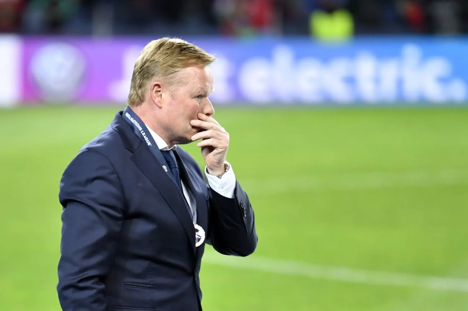 Netherlands coach Ronald Koeman walks in dejection after receiving his second place medal after the UEFA Nations League final soccer match between Portugal and Netherlands at the Dragao stadium in Porto, Portugal, Sunday, June 9, 2019. Portugal won 1-0. (AP Photo/Martin Meissner)
