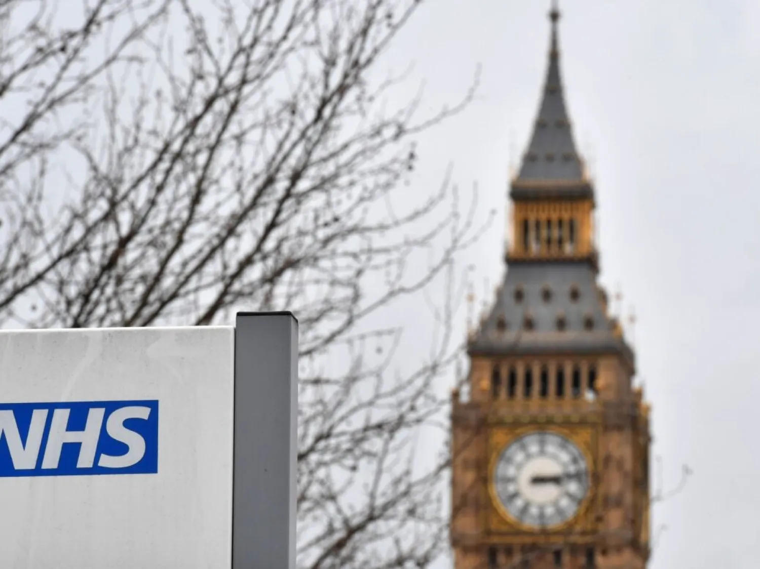 An NHS sign is pictured outside St Thomas' Hospital, near the Houses of Parliament. (BEN STANSALL/AFP via Getty Images.)
