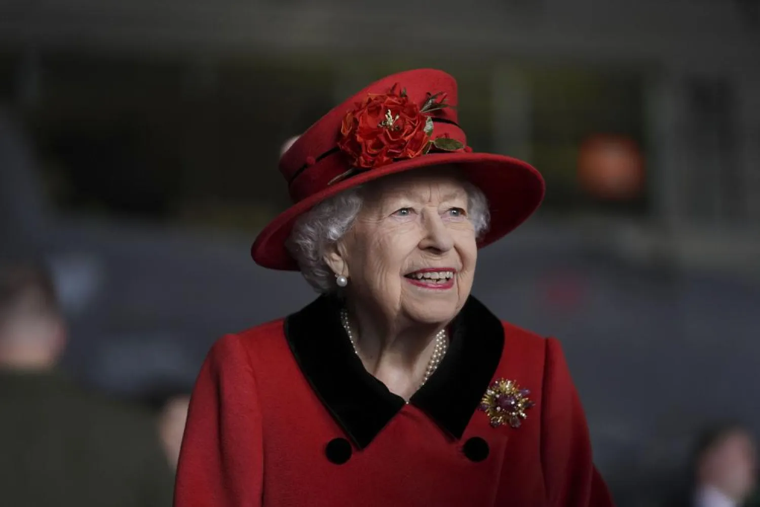 Britain's Queen Elizabeth II visits the HMS Queen Elizabeth at HM Naval Base, ahead of the ship's maiden deployment, in Portsmouth, England, Saturday May 22, 2021. (Steve Parsons/Pool Photo via AP)
