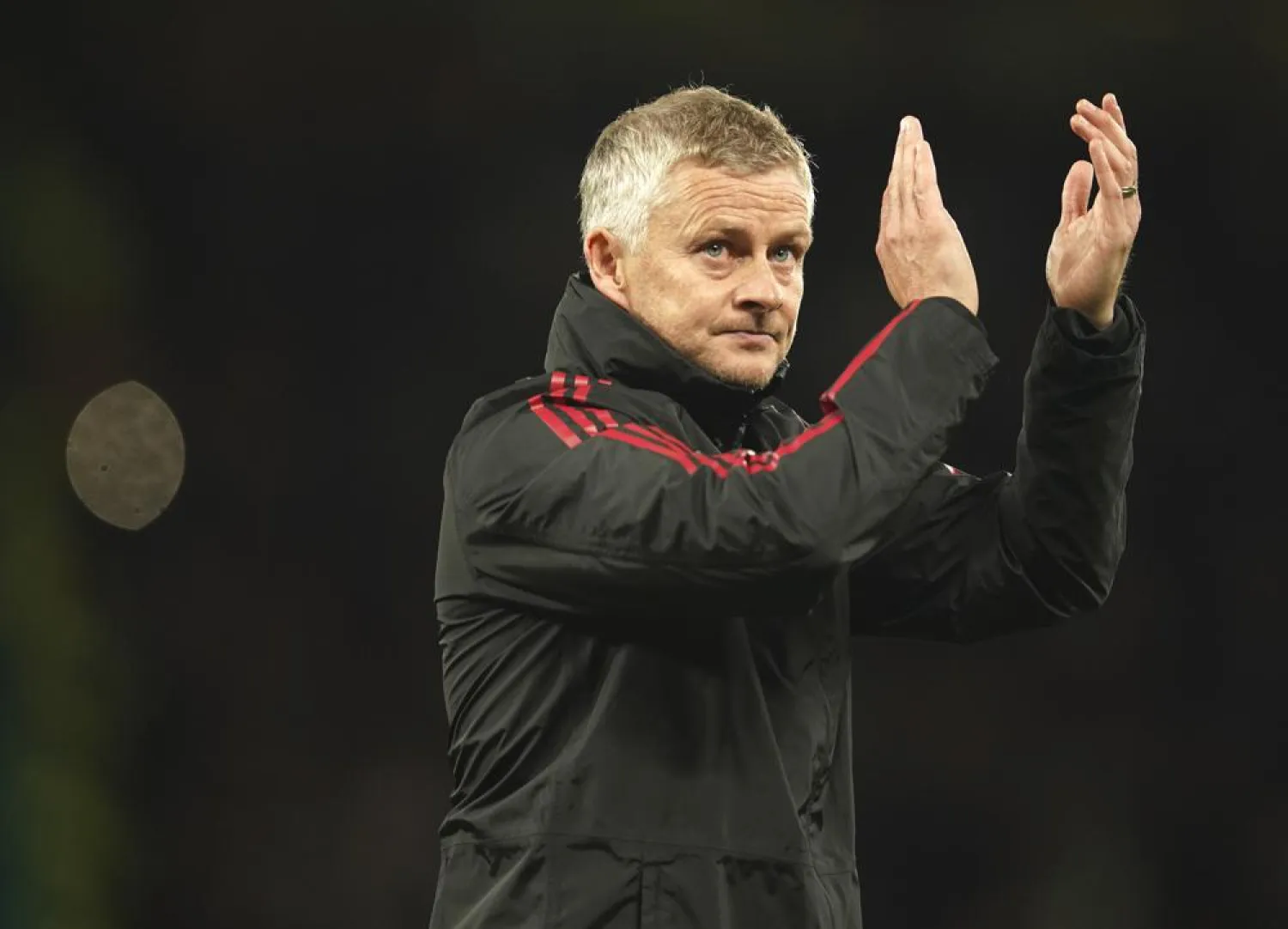 Manchester United's manager Ole Gunnar Solskjaer applauds at the end of the English League Cup soccer match between Manchester United and West Ham at Old Trafford in Manchester, England, Wednesday, Sept. 22, 2021. West Ham won the match 1-0. (AP Photo/Dave Thompson)
