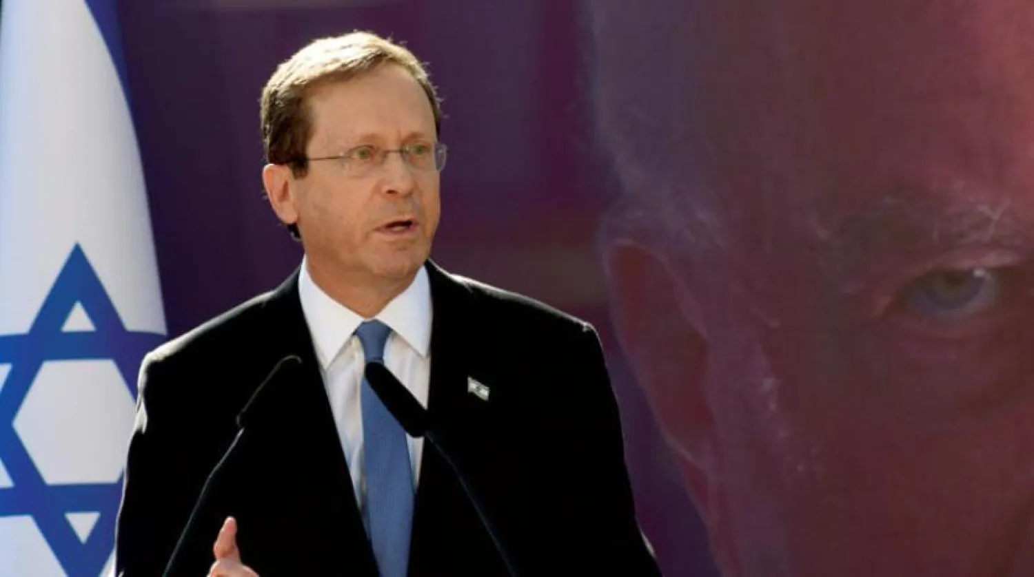 “I ask for forgiveness,” the Israeli president told Kafr Qasem citizens in Arabic. (Reuters) 