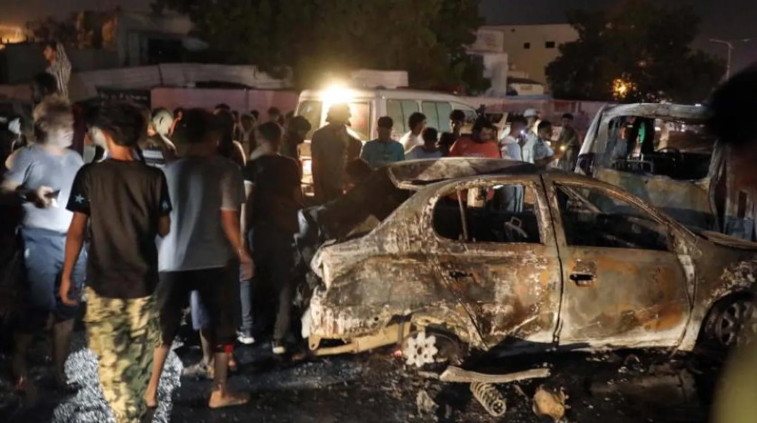 Yemeni at the explosion site in Aden International airport (EPA)
