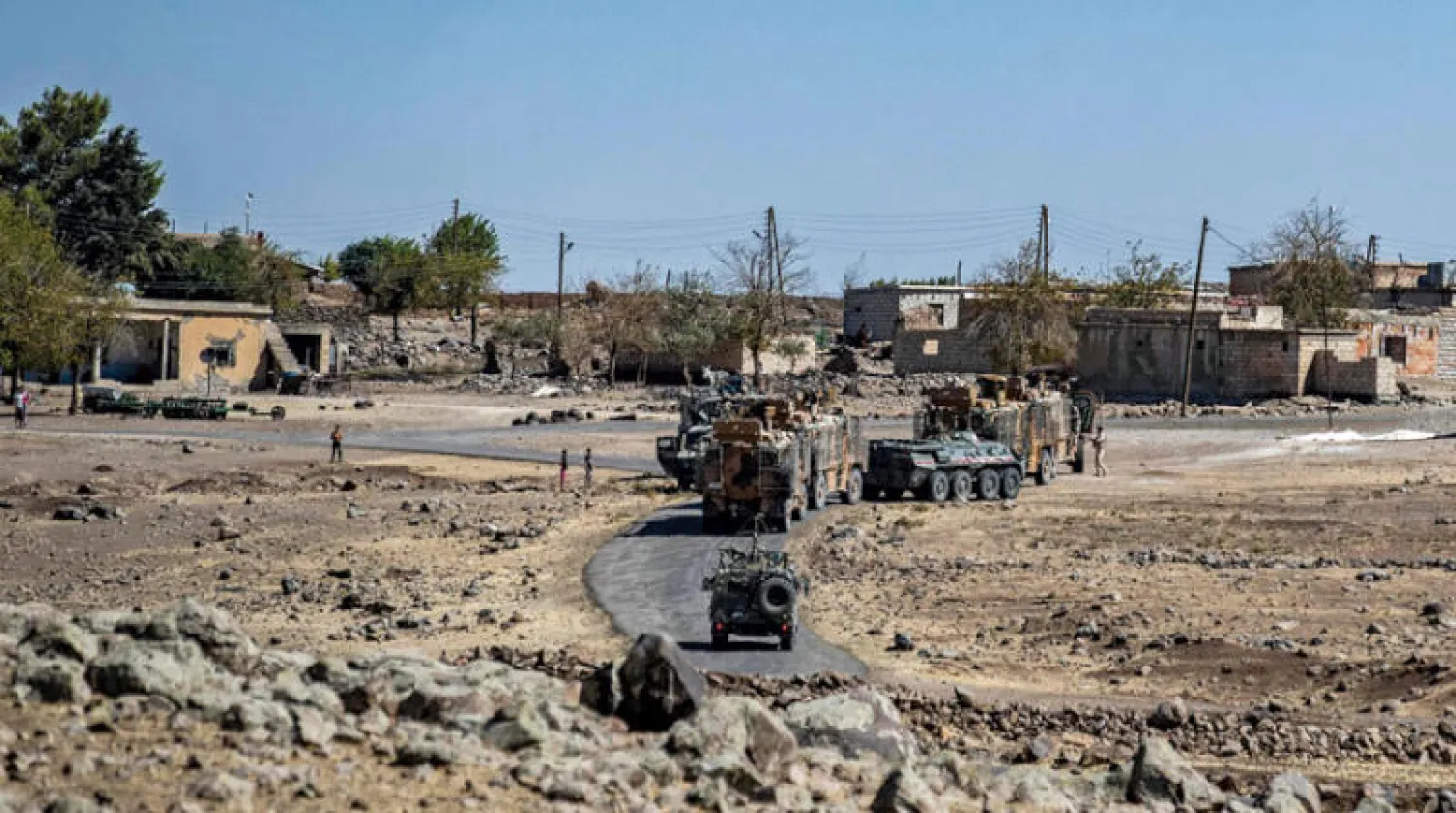 دورية روسية - تركية في الرميلان شمال شرقي سوريا في 16 سبتمبر الماضي (أ.ف.ب)