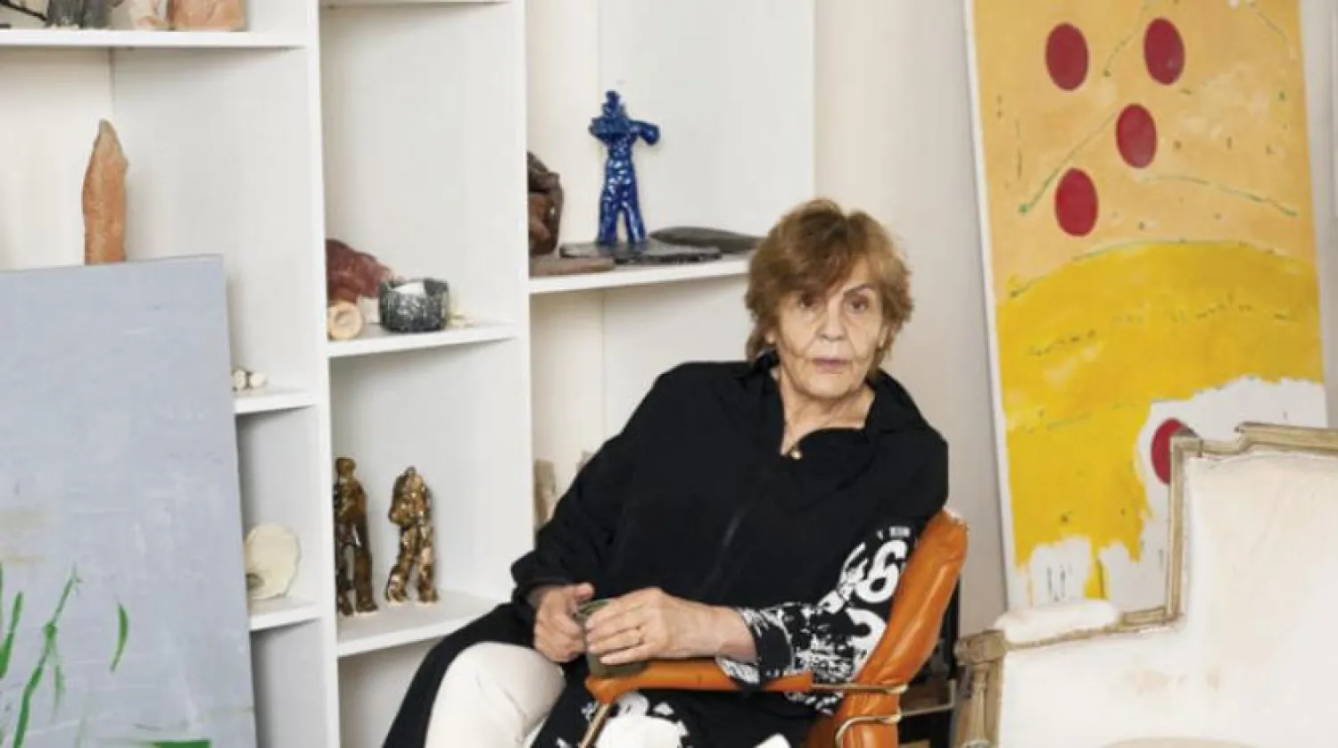 Artist Simone Fattal with some of her works.