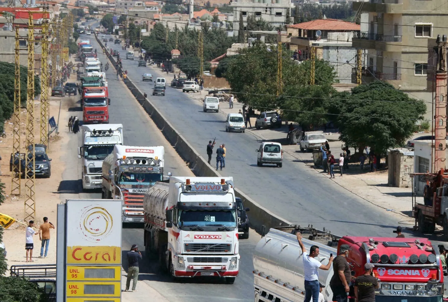 Tankers carrying Iranian fuel arrive from Syria at al-Ain in Hermel in east Lebanon's Bekaa Valley on September 16, 2021. (AFP)