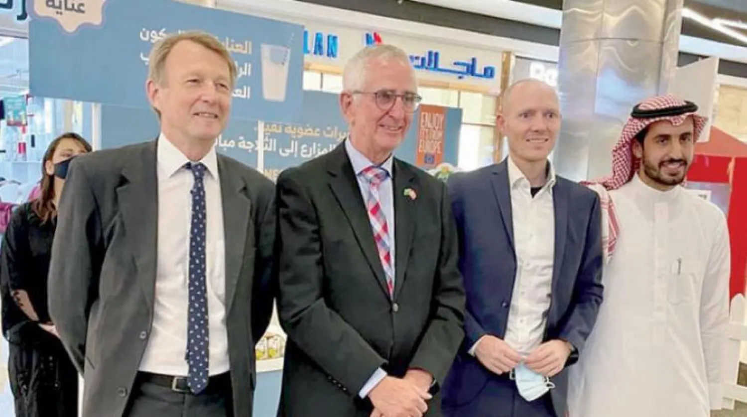 Jorgen Christensen, CEO of the Danish Dairy Board, and Denmark's ambassador Ole Moesby at the launch of the Danish Organic Dairy program, at Panorama Mall, Riyadh, Asharq Al-Awsat 