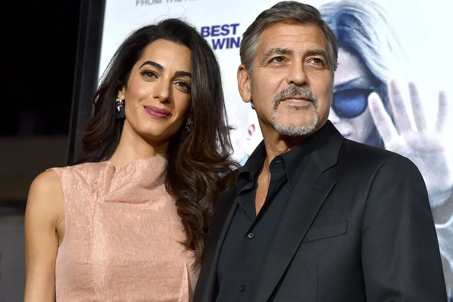 George Clooney has appealed to news outlets to keep his children’s faces out of the press, saying he fears that public photos would put their lives in jeopardy. (Getty Images)
