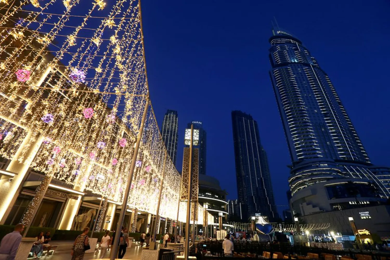 People walk outside The Dubai Mall in Dubai, United Arab Emirates March 12, 2020. Picture taken March 12, 2020.  (Reuters)