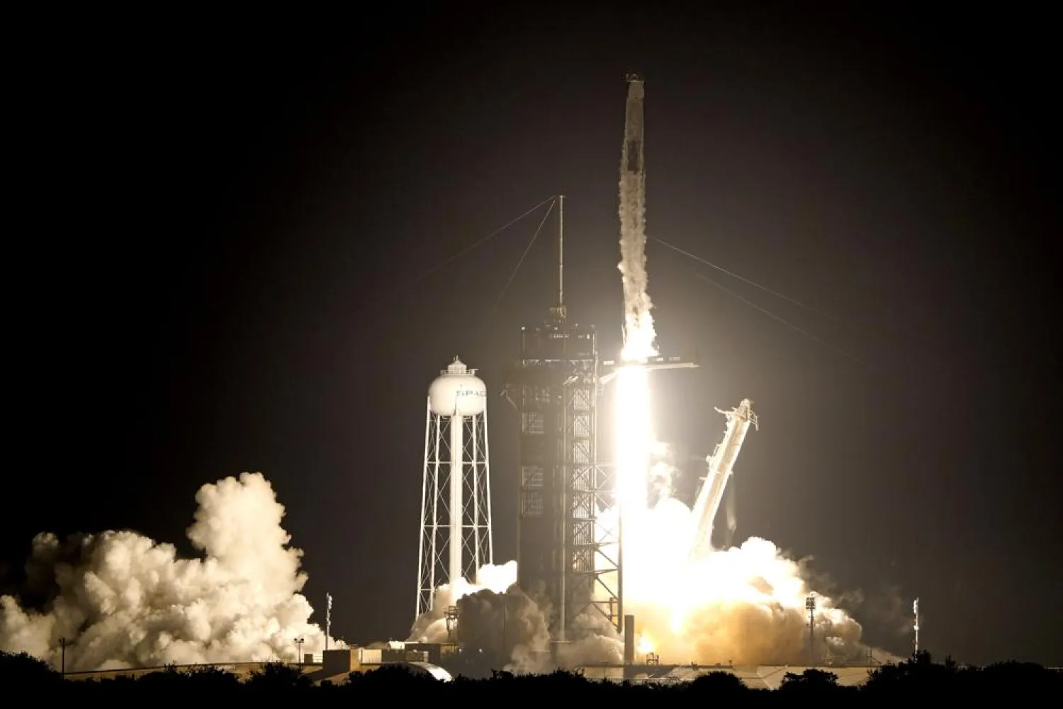A SpaceX Falcon 9 rocket with the Crew Dragon capsule lifts off from Launch Pad 39A at the Kennedy Space Center in Cape Canaveral, Fla., Wednesday, Nov. 10, 2021. (AP Photo/John Raoux)
